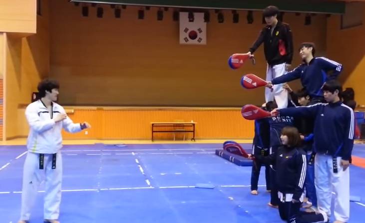 Korean Taekwondo Kicks Four Target Pad In One Jump Only